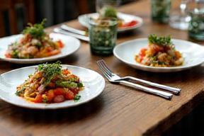 Beautifully arranged gourmet dishes on dining table